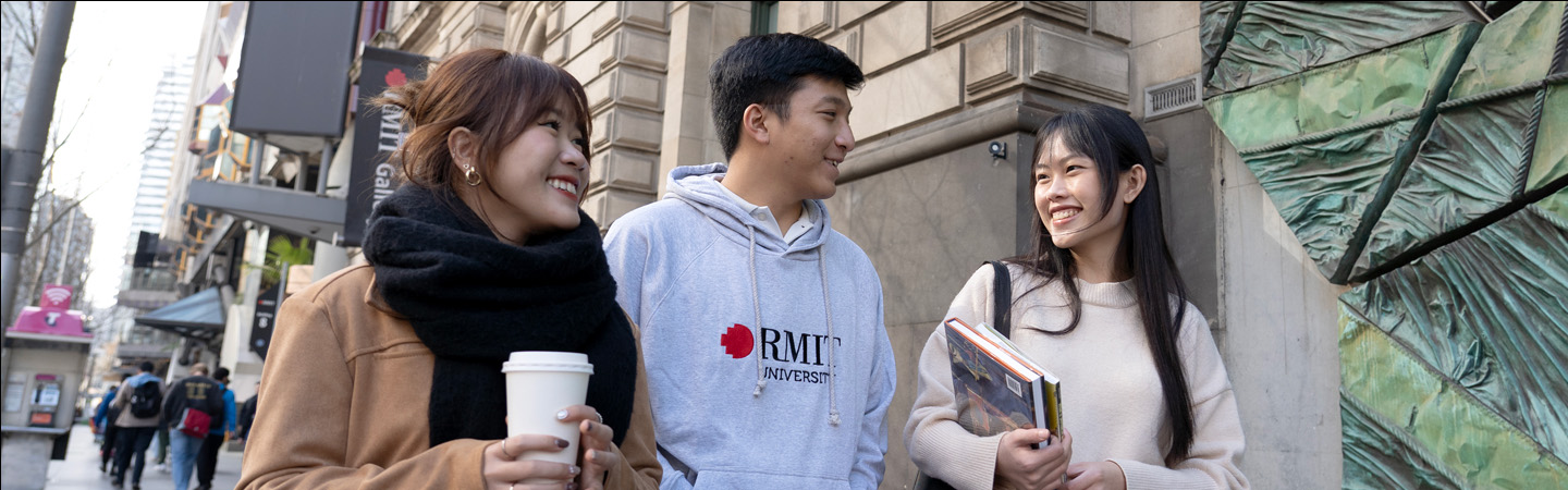 three-university-students-walking-chatting-1440x450-homepage-banner.jpg