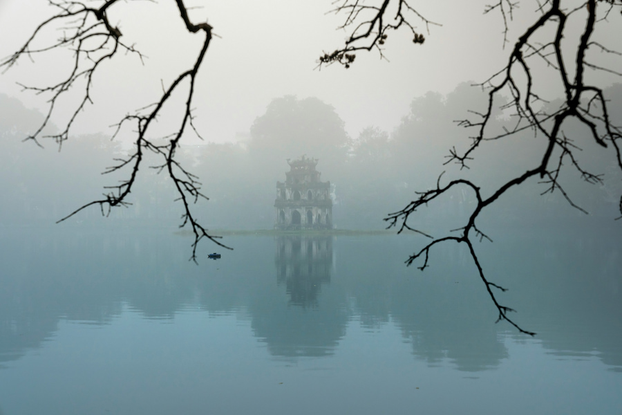 Turtle Tower in Hoan Kiem lake in Hanoi in mist