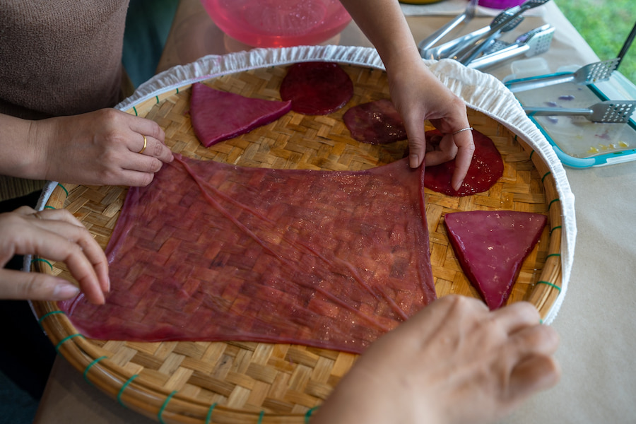 Sheets of bacterial cellulose textile being dried on a basket