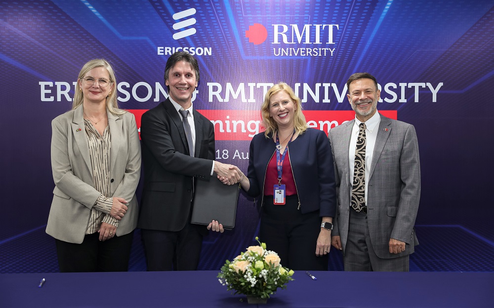 Leaders from Ericsson, RMIT, and the embassies of Sweden and Australia to Vietnam at the signing ceremony